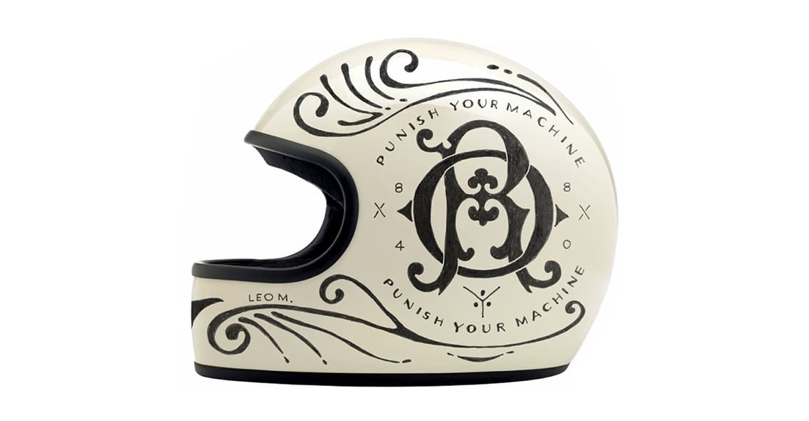 Bespoke visual storytelling through manual helmet customization techniques.