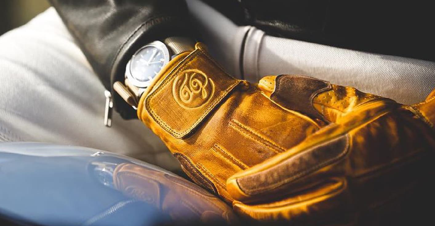 Artisanal branding details and woven label design for vintage-style garments.