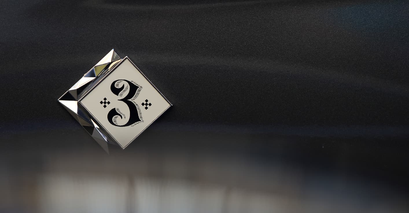 Iconic hand-lettering and typographic craftsmanship for automotive interior design.