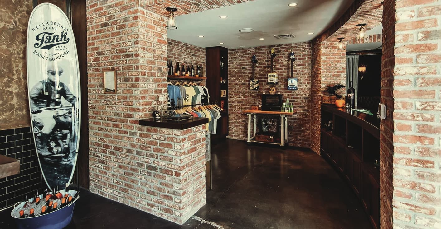 Heritage-style service station aesthetics and visual identity for Tank Garage.